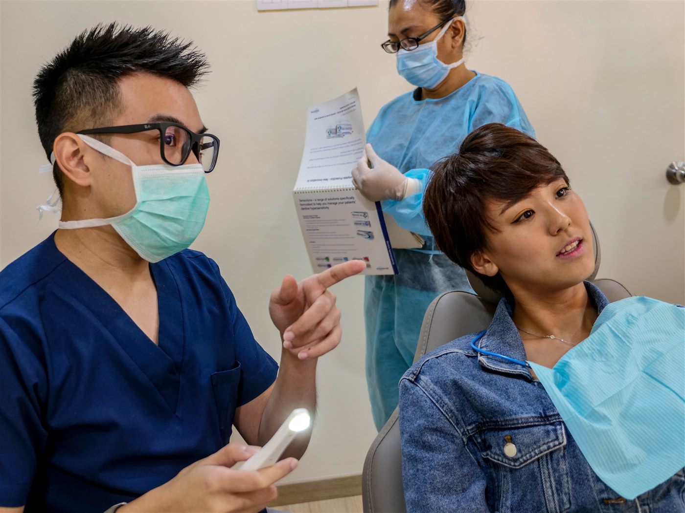 Dr Amirul explaining a treatment option to a patient